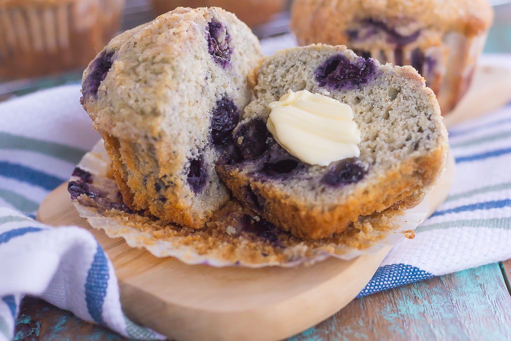 These Bakery Style Blueberry Muffins are filled with juicy blueberries that are swirled into a sweet batter and topped with a cinnamon streusel. Soft, moist, and bursting with flavor, these muffins are just as delicious as the ones that you would find at a bakery!