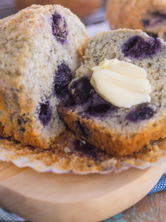 These Bakery Style Blueberry Muffins are filled with juicy blueberries that are swirled into a sweet batter and topped with a cinnamon streusel. Soft, moist, and bursting with flavor, these muffins are just as delicious as the ones that you would find at a bakery!