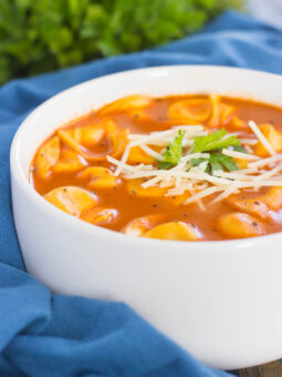 This Creamy Tomato Tortellini Soup is the perfect kind of comfort food for cold, winter days. Loaded with cheese tortellini, herbs, and made in one pot, you can have this rich and flavorful soup ready in less than thirty minutes!