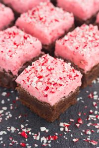 Top view of frosted peppermint brownies in squares