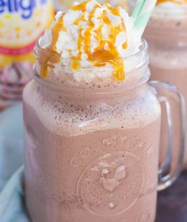 This Frozen Salted Caramel Mocha Hot Chocolate is a festive way to embrace the start of the holiday season. This easy drink is a sweet and creamy blend of hot chocolate, milk, and the rich flavors of salted caramel and mocha. Put a spin on traditional hot chocolate by serving this frozen drink instead!
