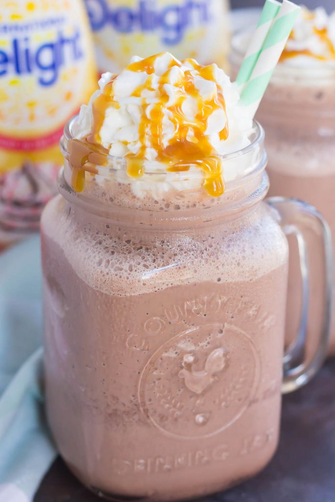This Frozen Salted Caramel Mocha Hot Chocolate is a festive way to embrace the start of the holiday season. This easy drink is a sweet and creamy blend of hot chocolate, milk, and the rich flavors of salted caramel and mocha. Put a spin on traditional hot chocolate by serving this frozen drink instead!
