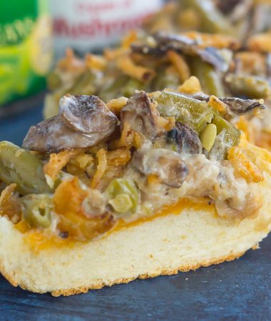 This Green Bean Casserole Cheesy Bread puts a creative spin on the classic holiday side dish. The zesty casserole is made in just one pan, piled on top of toasted cheesy bread, and then baked until warm and bubbly. This simple dish is fast, fresh, flavorful and will become the hit of the dinner table!