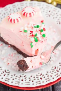 A bite of peppermint bark cheesecake on a fork