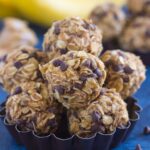 Packed with hearty oats, creamy peanut butter, bananas, and a sprinkling of chocolate, these no-bake Peanut Butter Banana Energy Bites make the perfect, on-the-go breakfast, snack, or even dessert!