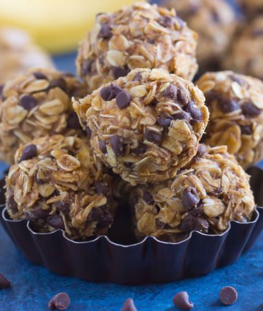Packed with hearty oats, creamy peanut butter, bananas, and a sprinkling of chocolate, these no-bake Peanut Butter Banana Energy Bites make the perfect, on-the-go breakfast, snack, or even dessert!