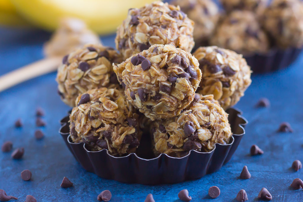 Packed with hearty oats, creamy peanut butter, bananas, and a sprinkling of chocolate, these no-bake Peanut Butter Banana Energy Bites make the perfect, on-the-go breakfast, snack, or even dessert!