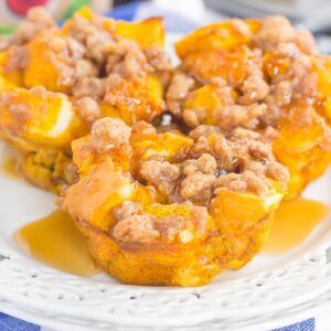 These Pumpkin French Toast Cups with Cinnamon Streusel are packed with cozy fall flavors and make the perfect weekend breakfast. Prepared the night before and made in a muffin tin, you can have this easy breakfast ready to be devoured in no time!