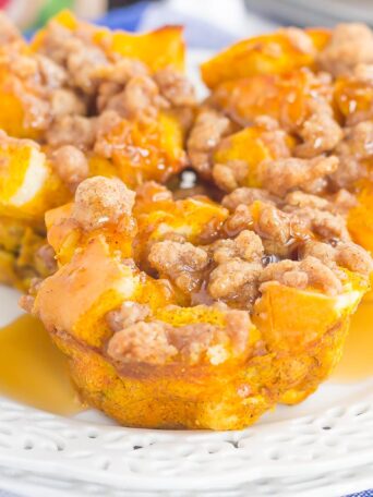 These Pumpkin French Toast Cups with Cinnamon Streusel are packed with cozy fall flavors and make the perfect weekend breakfast. Prepared the night before and made in a muffin tin, you can have this easy breakfast ready to be devoured in no time!