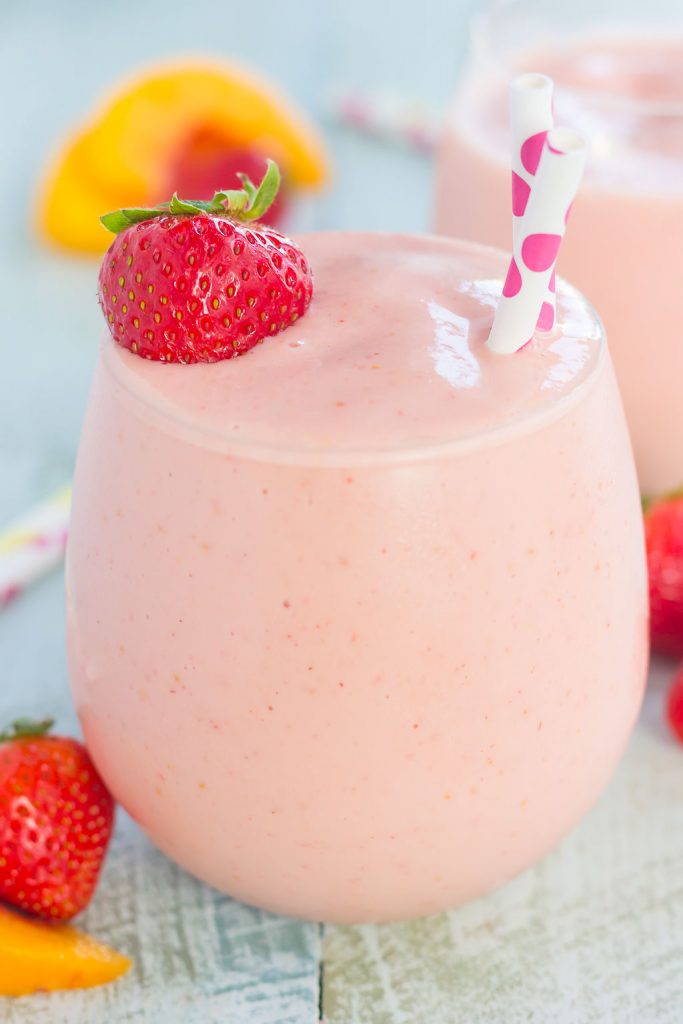 This Strawberry Peach Smoothie is thick, creamy, and packed with juicy strawberries and peaches. With just a few ingredients and hardly any prep time, this healthier breakfast or snack is perfect to satisfy your sweet tooth!