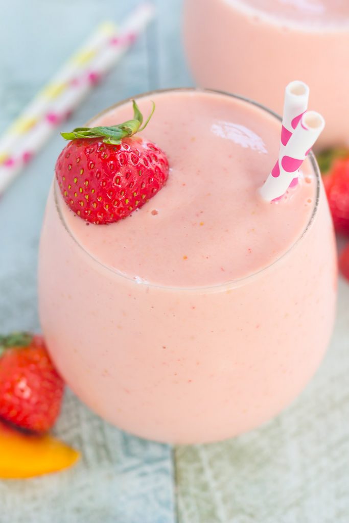 This Strawberry Peach Smoothie is thick, creamy, and packed with juicy strawberries and peaches. With just a few ingredients and hardly any prep time, this healthier breakfast or snack is perfect to satisfy your sweet tooth!