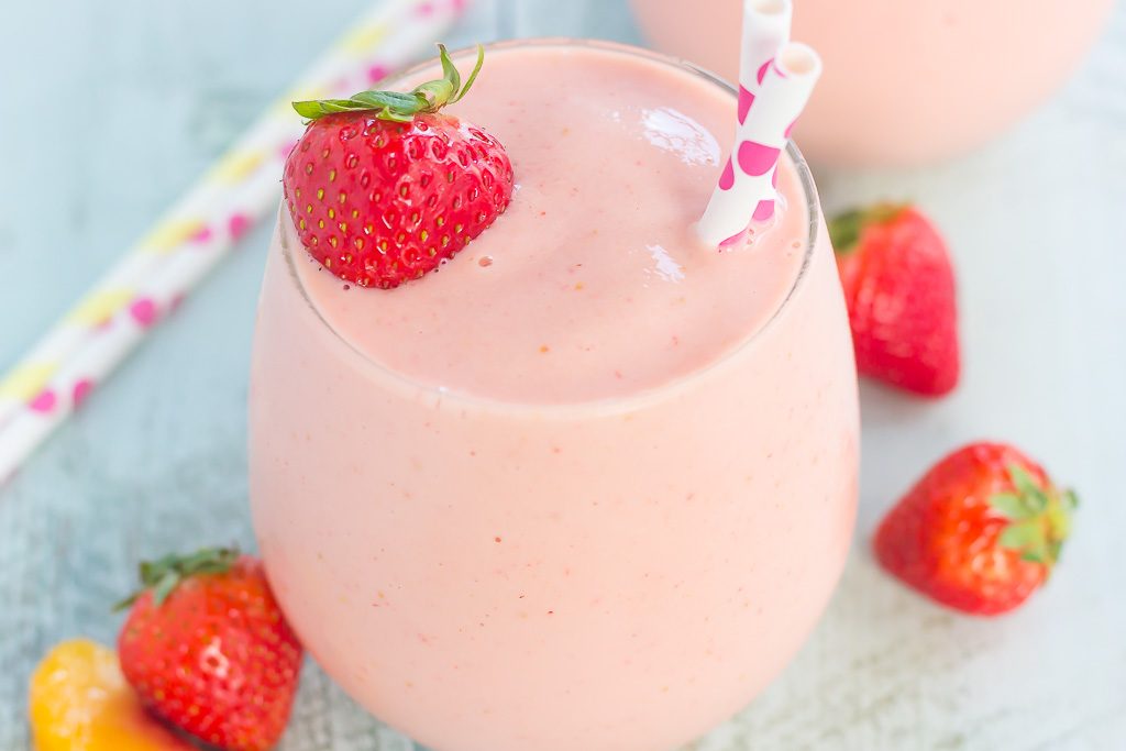 This Strawberry Peach Smoothie is thick, creamy, and packed with juicy strawberries and peaches. With just a few ingredients and hardly any prep time, this healthier breakfast or snack is perfect to satisfy your sweet tooth!