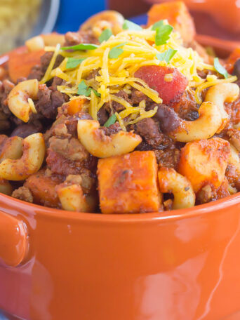 This Sweet Potato Chili Pasta is a one pot dish that's packed with the warm and comforting flavors of the season. Hearty, thick, and filled with sweet potatoes, beef, black beans, and pasta, you'll love this easy meal!