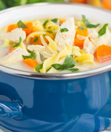 This Slow Cooker Lightened Up Creamy Chicken Noodle Soup is loaded with chicken, fresh vegetables, and tender noodles, all tossed in a creamy broth. Warm, comforting, and lightened up, you can feel good about indulging in the classic soup, with a creamy twist!