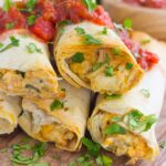 These Baked Chicken Ranch Taquitos are loaded with shredded chicken, cheddar cheese, cilantro, and a savory ranch cream cheese mixture. Fast, easy, and ready in less than 30 minutes, this simple dish is packed with flavor and perfect for the whole family!