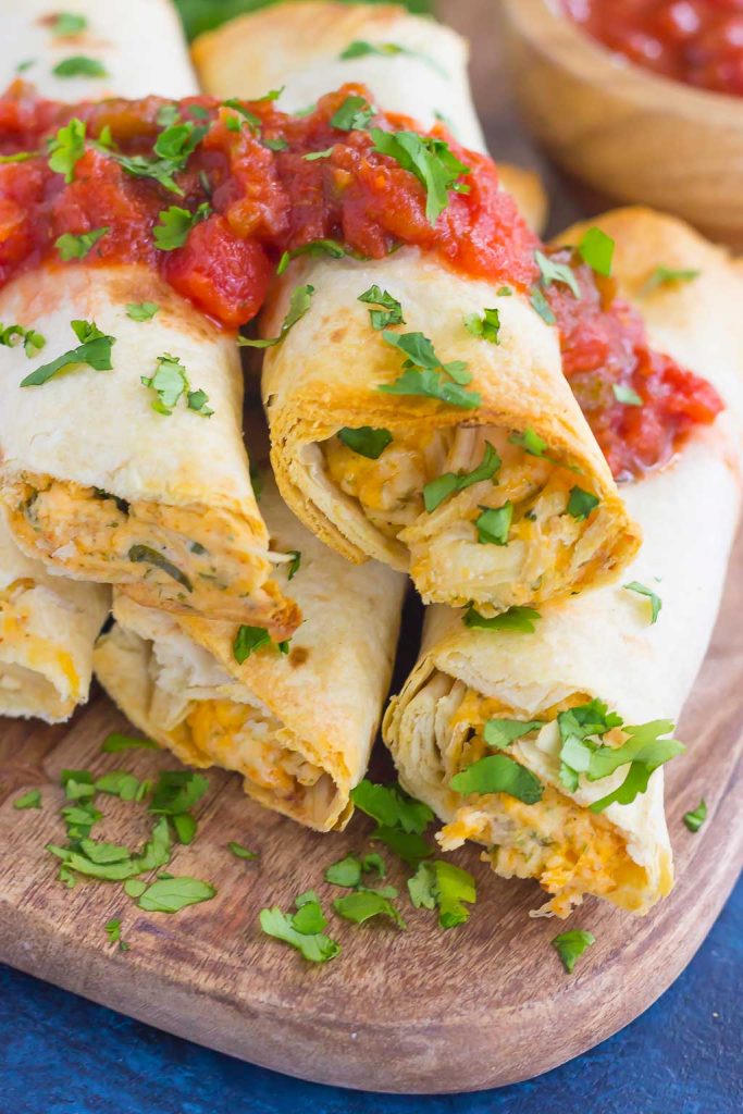 These Baked Chicken Ranch Taquitos are loaded with shredded chicken, cheddar cheese, cilantro, and a savory ranch cream cheese mixture. Fast, easy, and ready in less than 30 minutes, this simple dish is packed with flavor and perfect for the whole family!