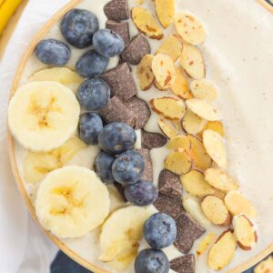 Filled with bananas, almond butter, and good-for-you ingredients, this Banana Nut Smoothie Bowl is a delicious way to start your day. Add your favorite toppings and your healthy, protein-filled bowl makes a deliciously simple breakfast or snack!