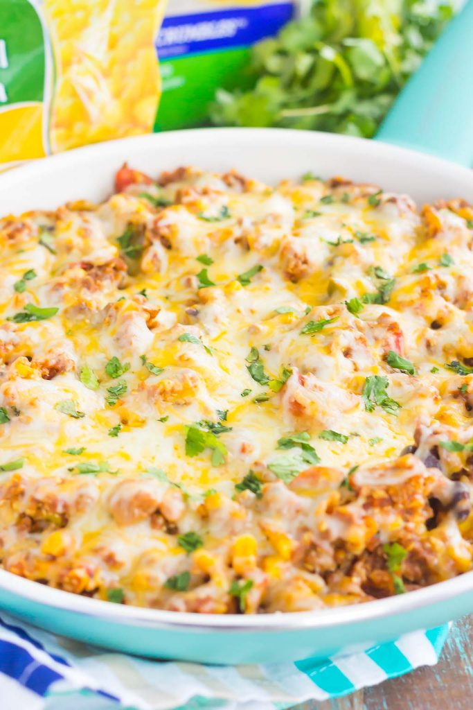 This Black Bean Taco Quinoa Skillet is an easy, one pan meal that the whole family will enjoy. Loaded with quinoa, black beans, veggies, and spices, this healthier dish is sure to be a dinnertime favorite!