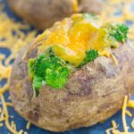 Seasoned potatoes are baked until soft and fluffy on the inside and crisp on the outside. Topped with fresh broccoli and a sprinkling of cheddar cheese, these Broccoli Cheddar Stuffed Baked Potatoes make deliciously easy "meal for one" that's packed with flavor!