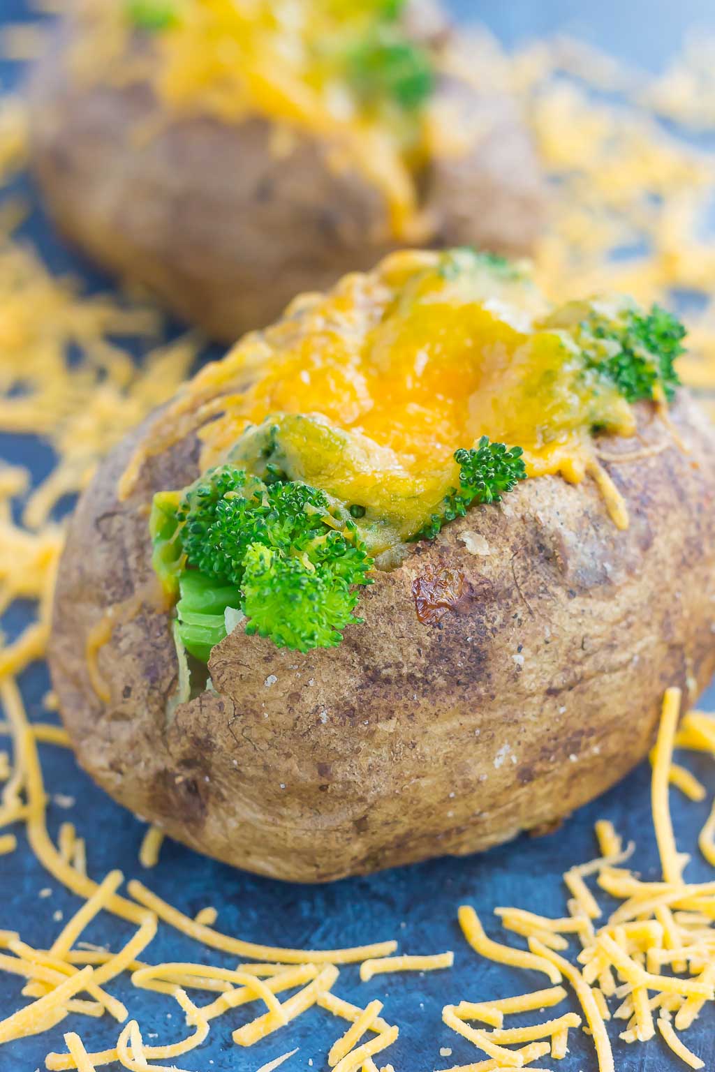 Seasoned potatoes are baked until soft and fluffy on the inside and crisp on the outside. Topped with fresh broccoli and a sprinkling of cheddar cheese, these Broccoli Cheddar Stuffed Baked Potatoes make deliciously easy "meal for one" that's packed with flavor!