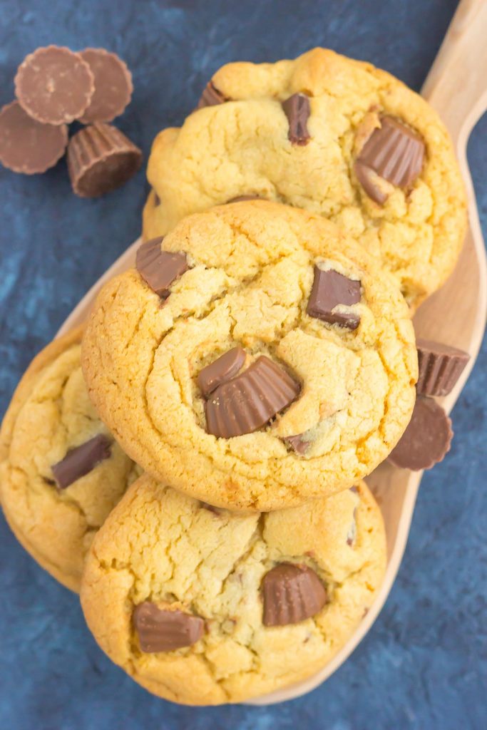 Overhead view of a pile of mini peanut butter cup cookies. 