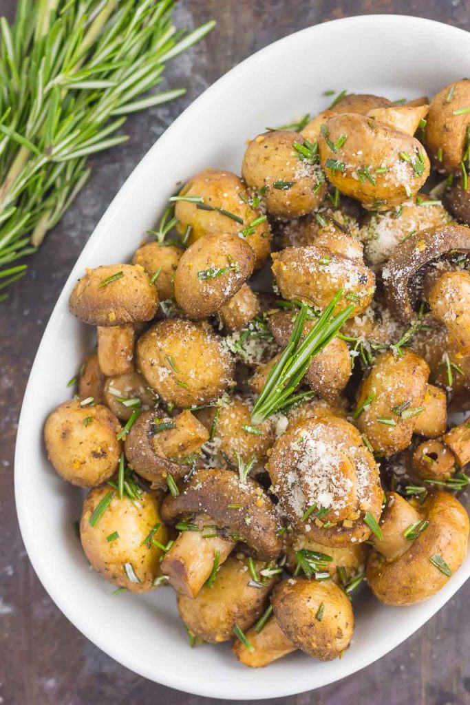 These Roasted Mushrooms with Garlic and Rosemary are loaded with a savory mixture of herbs and then baked until golden. Fast, fresh and easy to make, these mushrooms take less than 30 minutes from start to finish!