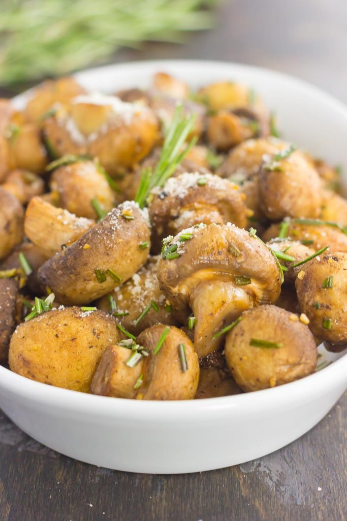 These Roasted Mushrooms with Garlic and Rosemary are loaded with a savory mixture of herbs and then baked until golden. Fast, fresh and easy to make, these mushrooms take less than 30 minutes from start to finish!