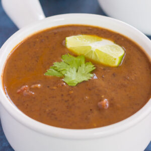 This Easy Black Bean Soup is zesty, filling, and ready in just 30 minutes. Loaded with black beans, spices, and lots of flavor, this simple soup serves as a hearty main dish and is perfect for a meatless entree!