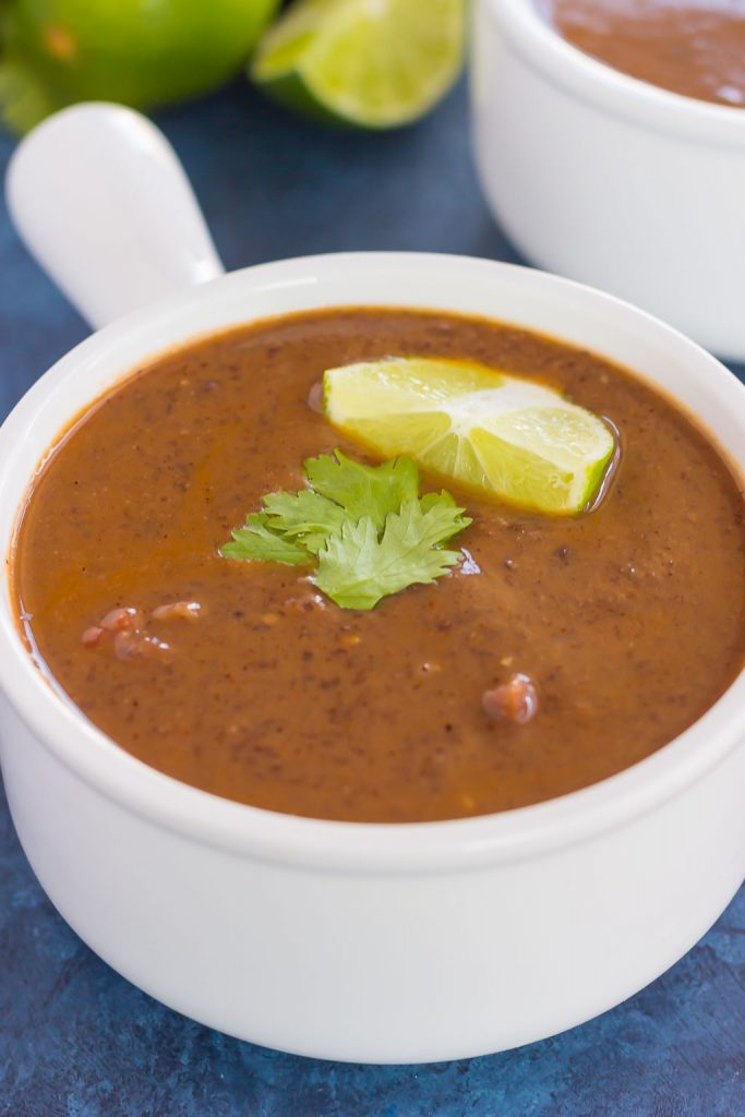 Easy black bean soup in a white soup bowl. 