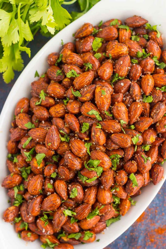 These Easy Chili Almonds are a simple snack that's packed with deliciousness. Roasted in a skillet and tossed with zesty flavors, these almonds are perfect for those snack cravings!