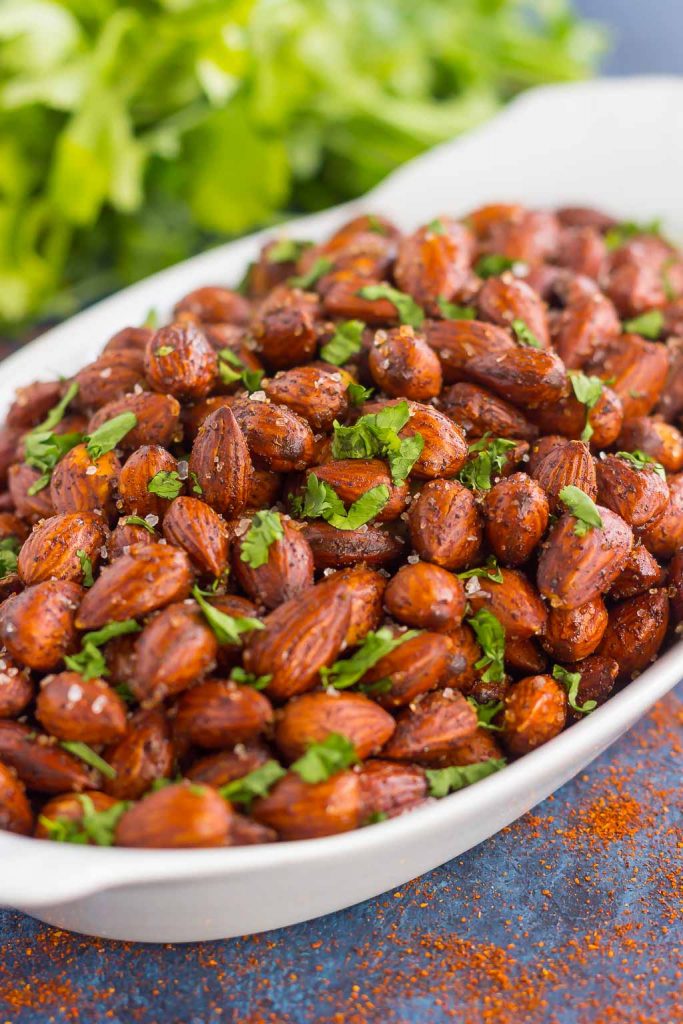 These Easy Chili Almonds are a simple snack that's packed with deliciousness. Roasted in a skillet and tossed with zesty flavors, these almonds are perfect for those snack cravings!