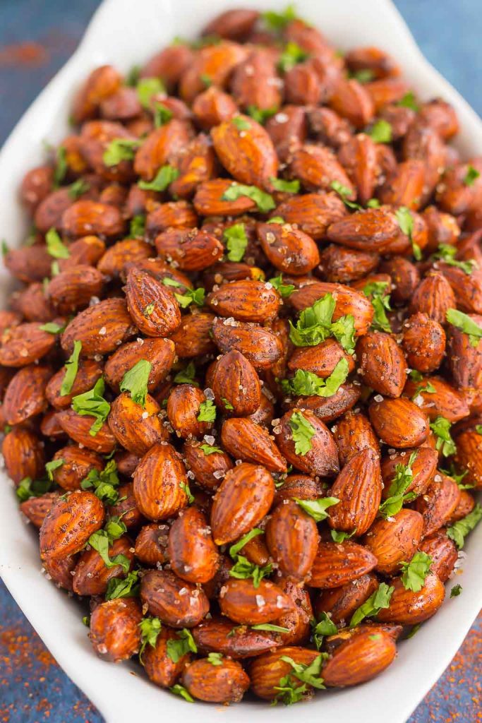 These Easy Chili Almonds are a simple snack that's packed with deliciousness. Roasted in a skillet and tossed with zesty flavors, these almonds are perfect for those snack cravings!