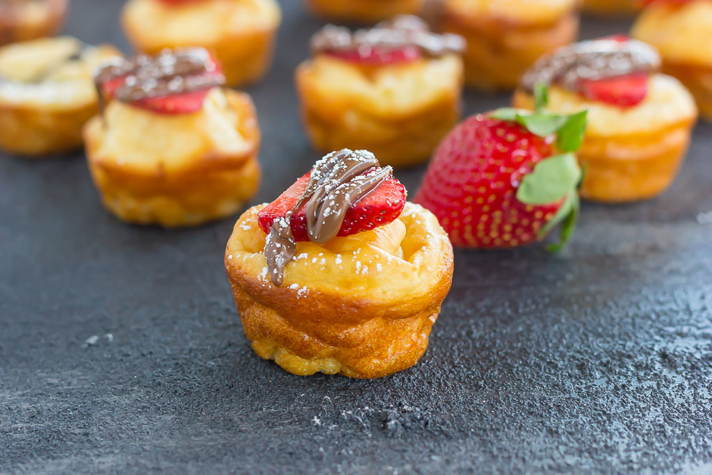 a pancake muffin with a strawberry and nutella on top