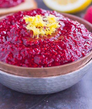 This Raspberry Chia Jam is simple, fresh, and packed with flavor. Fresh raspberries and protein-packed chia seeds make up the base of this easy jam, which is perfect for topping toast, bagels, and oatmeal. With just four simple ingredients and hardly any prep time, you can have this easy jam ready in minutes!