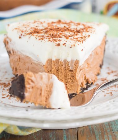 This Chocolate Nutella Cream Pie is filled with a smooth and creamy base of nutella, enveloped in a chocolate cookie crust and topped with homemade whipped cream. Easy to make and ready in no time, this decadent dessert is perfect for impressing dessert lovers everywhere!