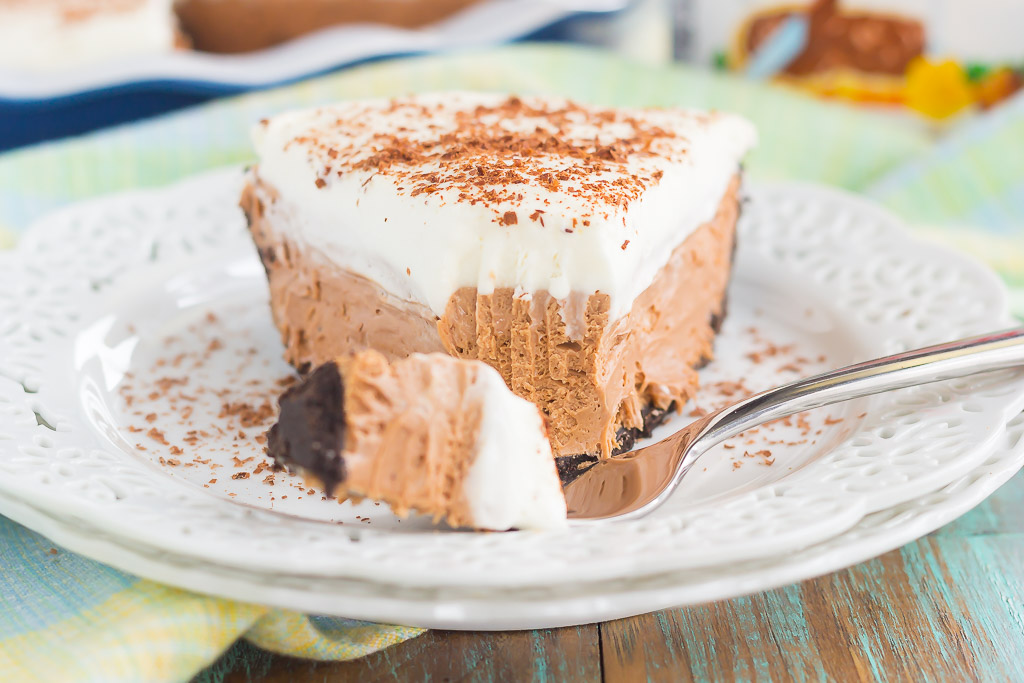 This Chocolate Nutella Cream Pie is filled with a smooth and creamy base of nutella, enveloped in a chocolate cookie crust and topped with homemade whipped cream. Easy to make and ready in no time, this decadent dessert is perfect for impressing dessert lovers everywhere!