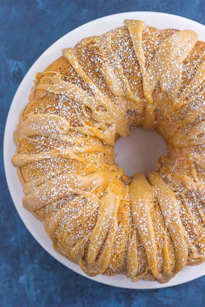 This Cinnamon Streusel Butter Cake with Caramel Icing is a decadent dessert that is sure to impress everyone. A moist and rich batter is sweetened with hints of butter, swirled with cinnamon streusel, and then topped with a rich, caramel icing. Easy to make and even better to eat, this cake will quickly become a favorite in your household!