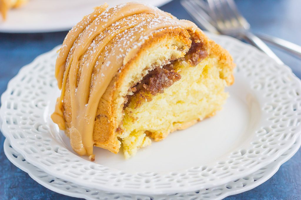 This Cinnamon Streusel Butter Cake with Caramel Icing is a decadent dessert that is sure to impress everyone. A moist and rich batter is sweetened with hints of butter, swirled with cinnamon streusel, and then topped with a rich, caramel icing. Easy to make and even better to eat, this cake will quickly become a favorite in your household!