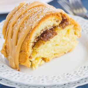 This Cinnamon Streusel Butter Cake with Caramel Icing is a decadent dessert that is sure to impress everyone. A moist and rich batter is sweetened with hints of butter, swirled with cinnamon streusel, and then topped with a rich, caramel icing. Easy to make and even better to eat, this cake will quickly become a favorite in your household!