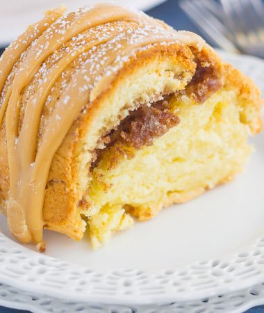 This Cinnamon Streusel Butter Cake with Caramel Icing is a decadent dessert that is sure to impress everyone. A moist and rich batter is sweetened with hints of butter, swirled with cinnamon streusel, and then topped with a rich, caramel icing. Easy to make and even better to eat, this cake will quickly become a favorite in your household!