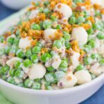 Filled with crunchy peas, feta cheese, red onion, and crumbled bacon, this Creamy Pea Salad will take your salad experience to a whole new level!