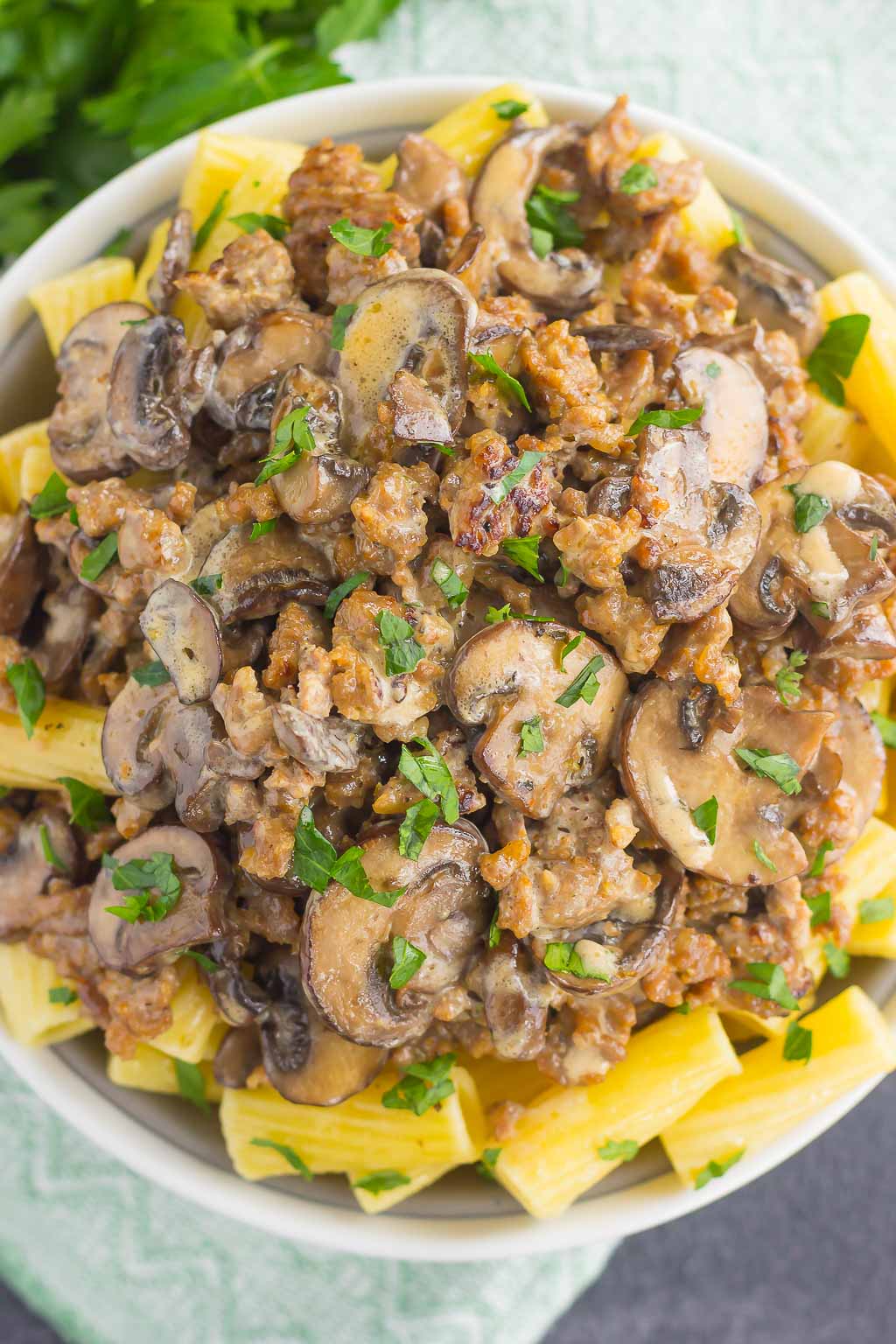 This Creamy Sausage and Mushroom Rigatoni is the perfect comfort dish that's ready in just 30 minutes. Zesty sausage, fresh mushrooms and rigatoni pasta are tossed in flavorful cream sauce. Hearty, comforting, and all-around delicious, this meal-time favorite is sure to be a winner all year long!
