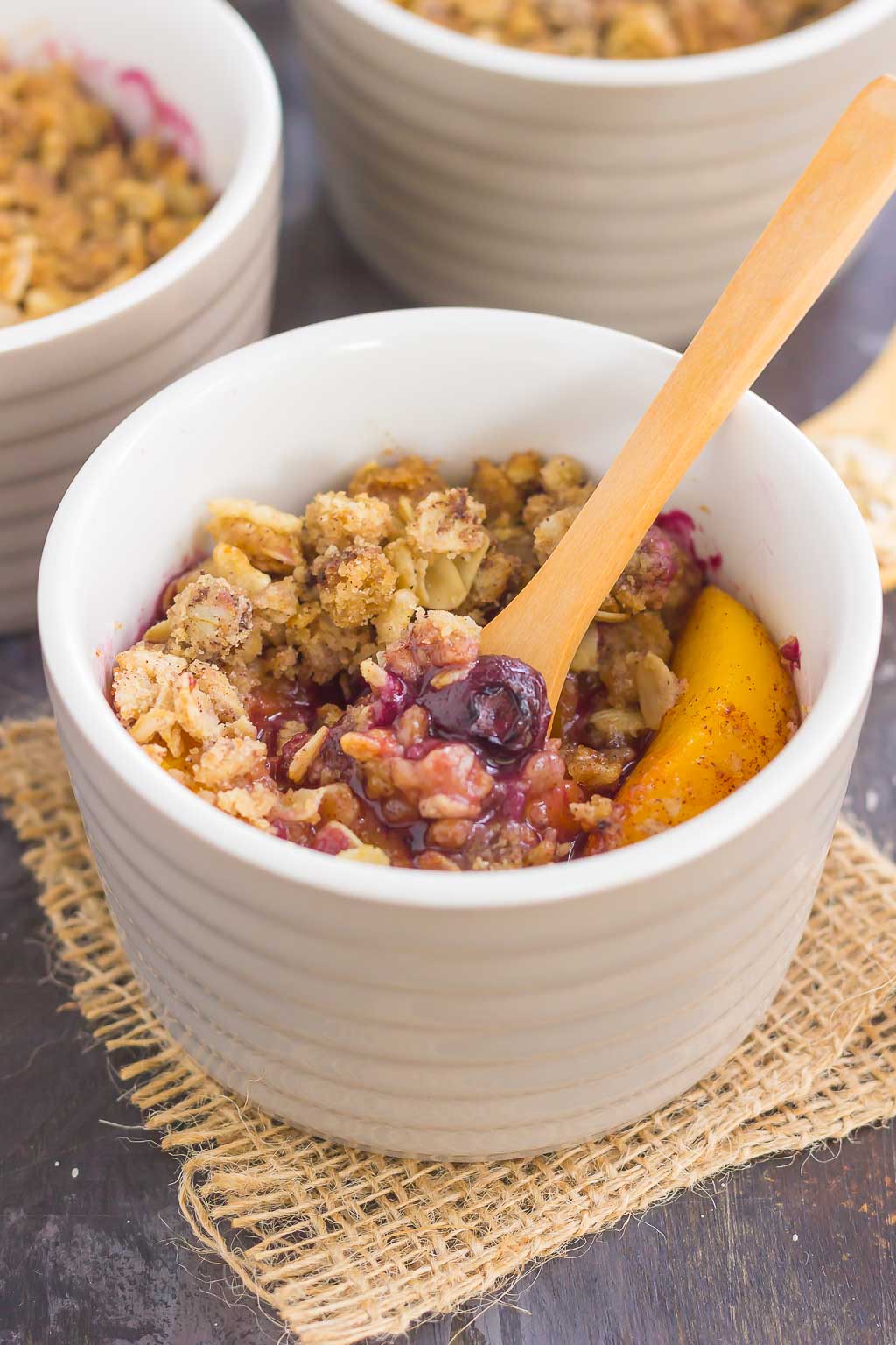 With fresh blueberries, juicy peaches, and a buttery crumble topping, this Peach Blueberry Crisp will quickly become your favorite dessert!