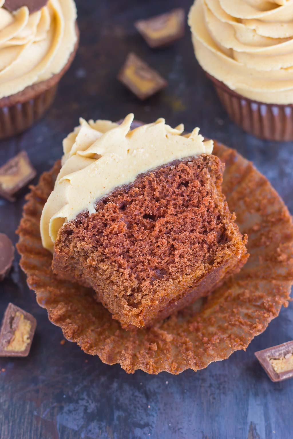 These Chocolate Cupcakes with Peanut Butter Frosting are a deliciously sweet dessert for everyone to enjoy. If you're a fan of chocolate and peanut butter, you'll love the rich and fluffy cupcakes that are piled high with a creamy and silky frosting!