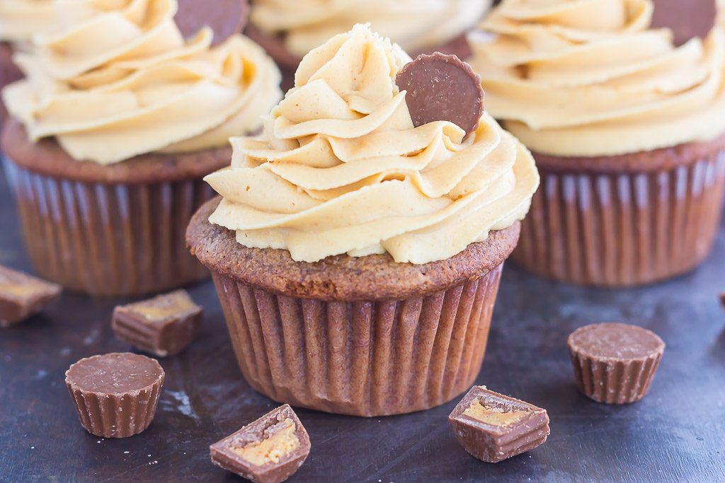 These Chocolate Cupcakes with Peanut Butter Frosting are a deliciously sweet dessert for everyone to enjoy. If you're a fan of chocolate and peanut butter, you'll love the rich and fluffy cupcakes that are piled high with a creamy and silky frosting!