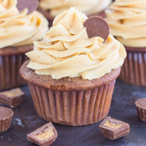 These Chocolate Cupcakes with Peanut Butter Frosting are a deliciously sweet dessert for everyone to enjoy. If you're a fan of chocolate and peanut butter, you'll love the rich and fluffy cupcakes that are piled high with a creamy and silky frosting!