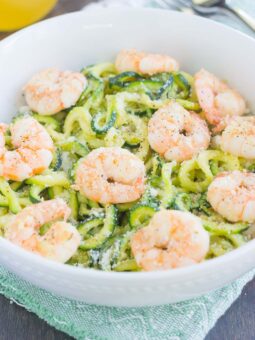 These Garlic Parmesan Zoodles with Shrimp are a healthier, one pan meal that's low carb and packed with flavor. Tender zucchini noodles are tossed with shrimp and seasoned with savory garlic and creamy Parmesan cheese. Made in one pan and ready in less than 20 minutes, this meal is perfect for busy weeknights!