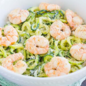 These Garlic Parmesan Zoodles with Shrimp are a healthier, one pan meal that's low carb and packed with flavor. Tender zucchini noodles are tossed with shrimp and seasoned with savory garlic and creamy Parmesan cheese. Made in one pan and ready in less than 20 minutes, this meal is perfect for busy weeknights!