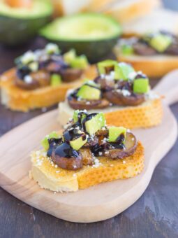 This Mushroom, Avocado and Feta Toast combines fresh mushrooms, ripe avocado and creamy feta cheese, piled high on toasted bread and drizzled with a balsamic glaze. This simple toast makes a deliciously easy appetizer or side dish!