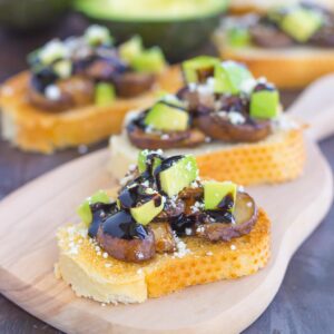 This Mushroom, Avocado and Feta Toast combines fresh mushrooms, ripe avocado and creamy feta cheese, piled high on toasted bread and drizzled with a balsamic glaze. This simple toast makes a deliciously easy appetizer or side dish!